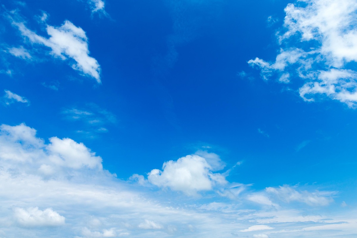 BLUE color psychology: blue sky background with tiny clouds