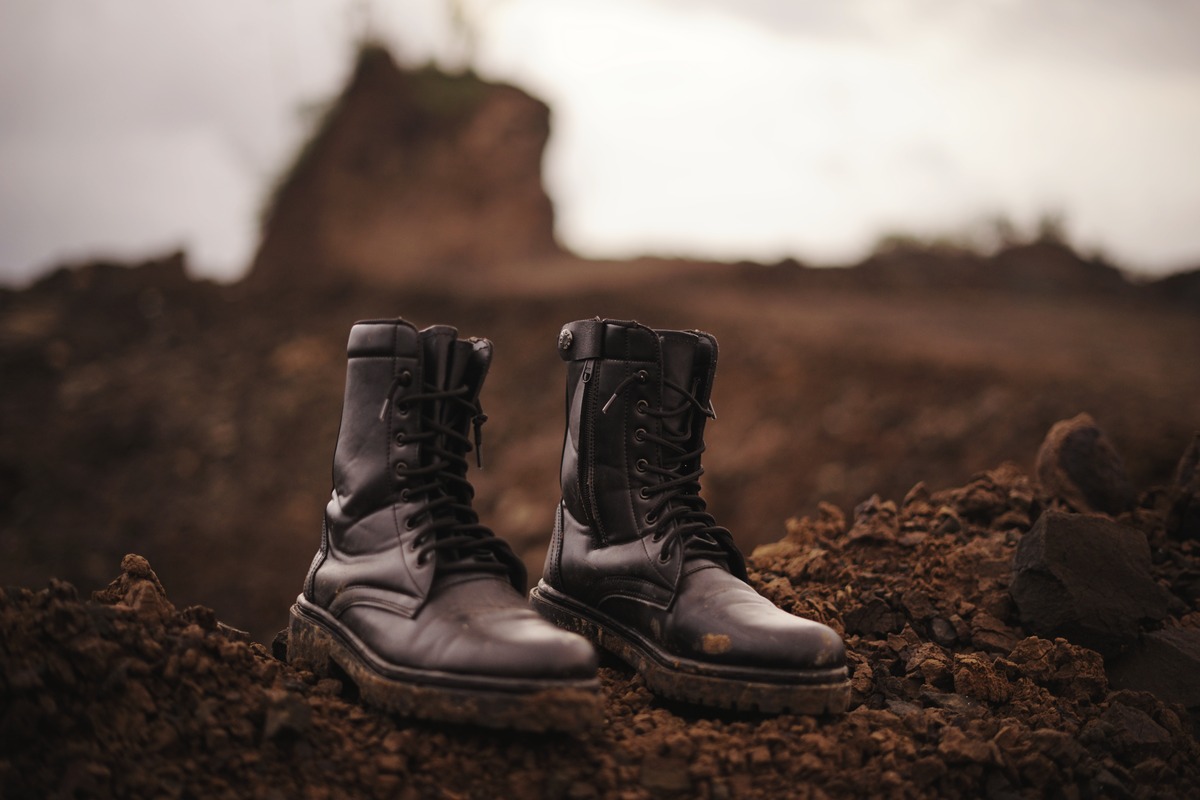 BROWN color psychology: Close-up of shoes on land